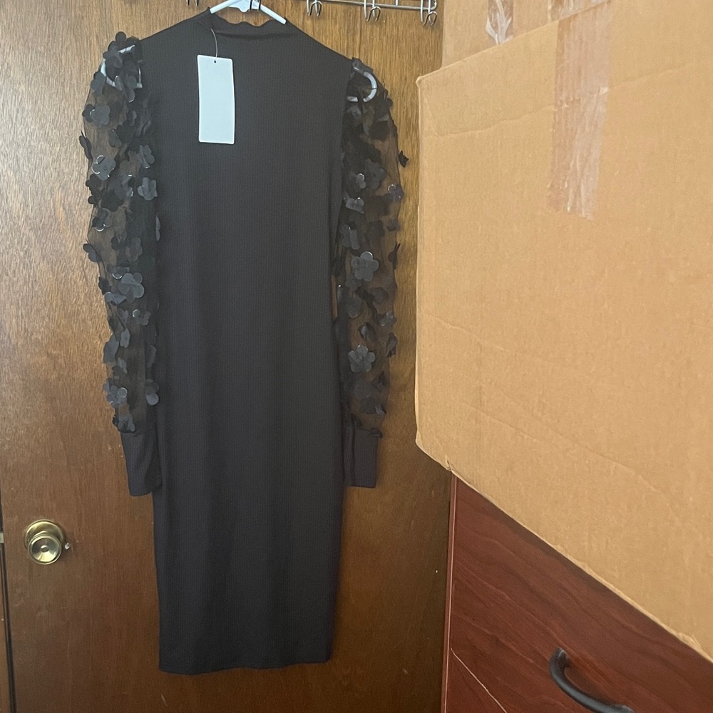 Elegant Black Dress with Floral Sleeves